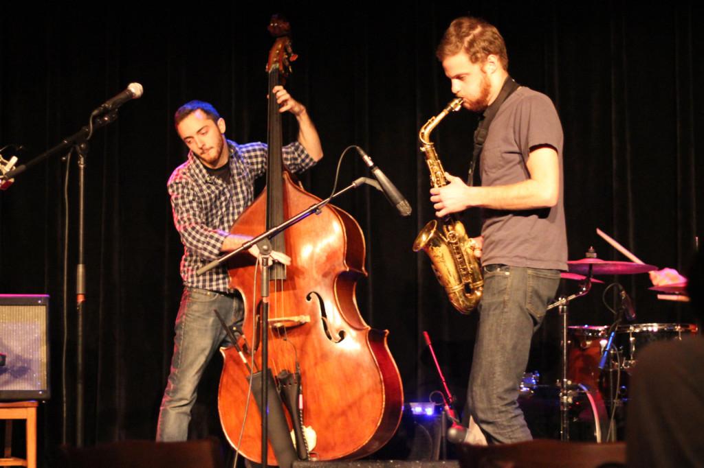 Conservatory seniors Cory Todd (left) and Nate Mendelsohn perform as part of Men With Short Beards at the Cat in the Cream on Saturday. The quartet melded together a variety of genres during its improvised set.