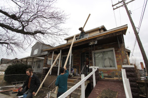 Students working to restore communities in Detroit during Winter Term and take part in renovations