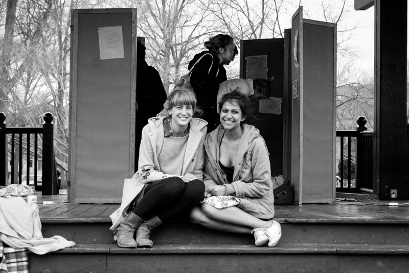 'Safe+Sound' organizers College junior Sophie Hess (left) and College sophomore Tinni Bhattacharyya pose on the steps of the Tappan Square bandstand during their exhibition. The exhibition featured a combination of anonymously submitted personal stories of sexualized violence and works
of art by Oberlin students.