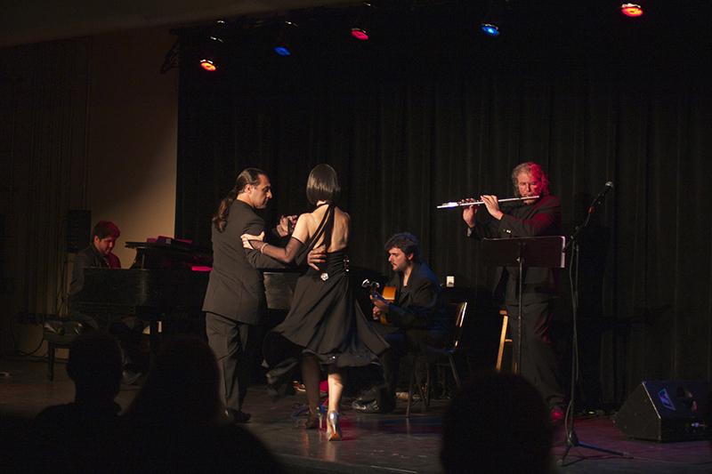 The Tami Tango Trio — Leandro Marquesano (left), Eduardo Tami and Emiliano Ferrer — per- forms Astor Piazzolla’s “Oblivion” while the Argentine duo Claudia Marciano and Facundo Barrionuevo dance onstage. The trio presented a concert of traditional tango music at the Cat in the Cream Sunday Night.