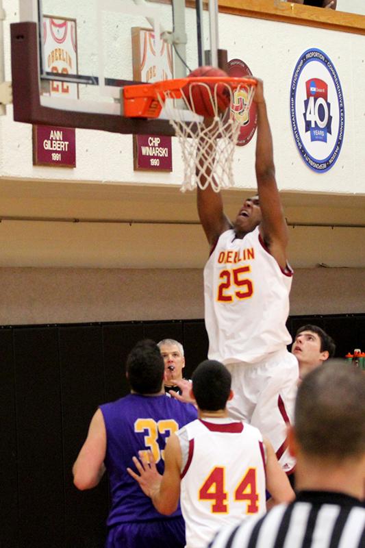 Junior Randall Ollie dunks the ball against the Elmira College Soaring Eagles
during the Nov. 26 game last season. Ollie was second on the team in scoring and first in rebounds and blocks last season.