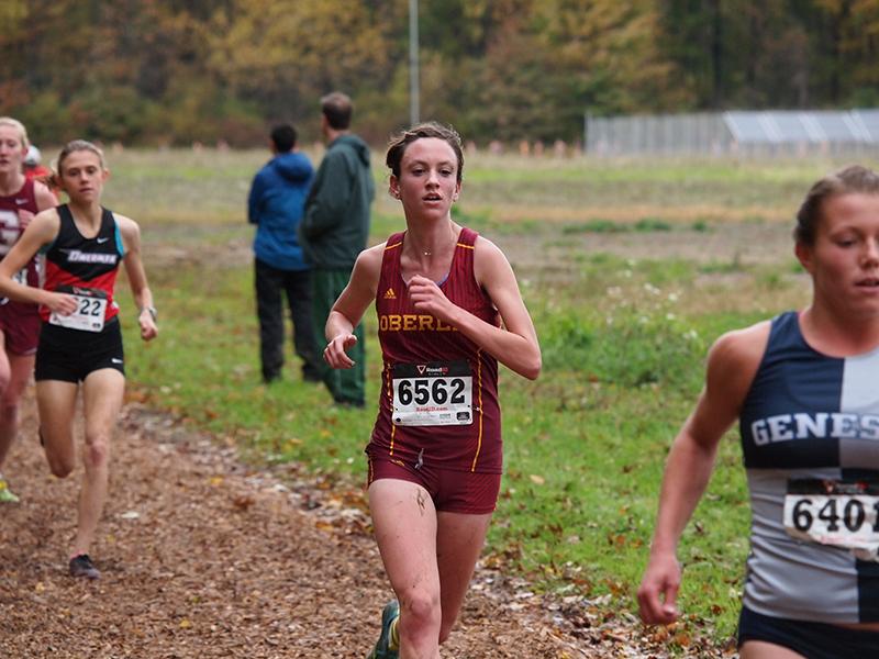 Senior Emma Lehmann outkicks their opponents at a race earlier this season. Lehmann earned an All-American title for their 9th place finish in the 2014 NCAA Nationals last Saturday.