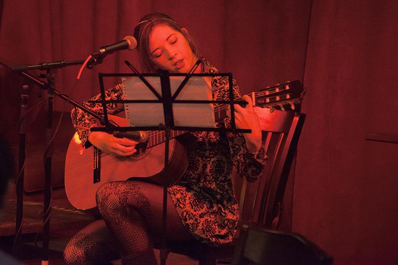 Musical+Studies+major%2C+singer-songwriter+and+College+senior+Autumn+Burnett+strums+her+mother%E2%80%99s+guitar.+Aside+from+technical+issues%2C+Burnett%E2%80%99s+Saturday+performance+at+the+Slow+Train+Cafe%CC%81+delighted+a+welcoming+crowd.