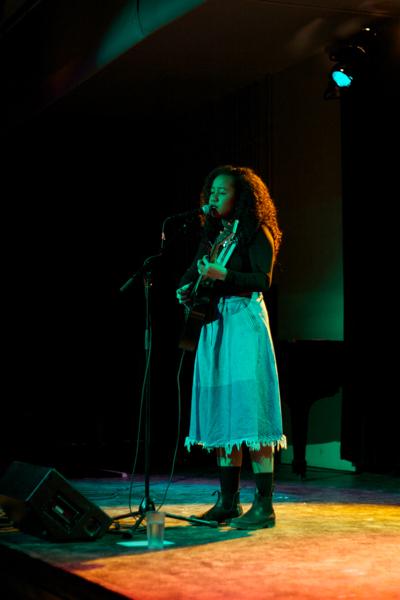 Singer-songwriter Nakaya strums her guitar as she serenades an audience at the Cat in the Cream. Her music flaunts a mixture of folk, R&B and electronic influences, and
￼explores themes of girlhood and self-love.
