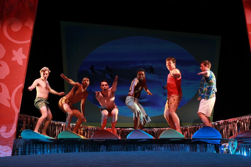 College first-year Evan Board (left) and College seniors Preston Crowder, Axandre Oge, Colin Anderson and Tae Braun toe the line between ’60s beach party horror and humorous satire aimed at heteronormativity in Psycho Beach Party. The play, written by Charles Busch and directed by Associate Professor of Theater Matthew Wright, opened last night and will continue tonight, Saturday and Sunday in Hall Auditorium.
