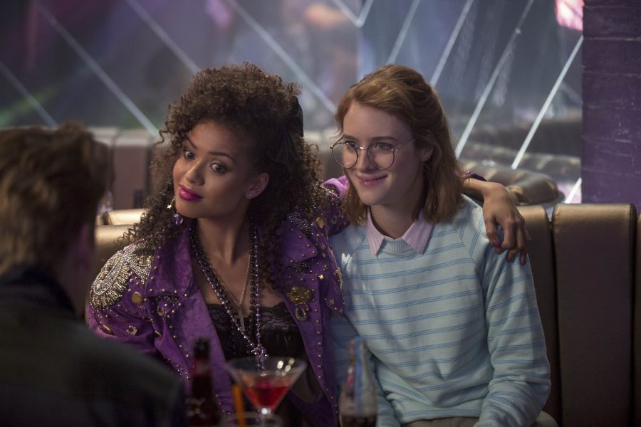 Characters Kelly (Gugu Mbatha-Raw, left) and Yorkie (Mackenzie Davis, right) begin a relationship
that will undergo the test of time in “San Junipero,” the fourth of six new episodes in season
three of Netflix’s Black Mirror.