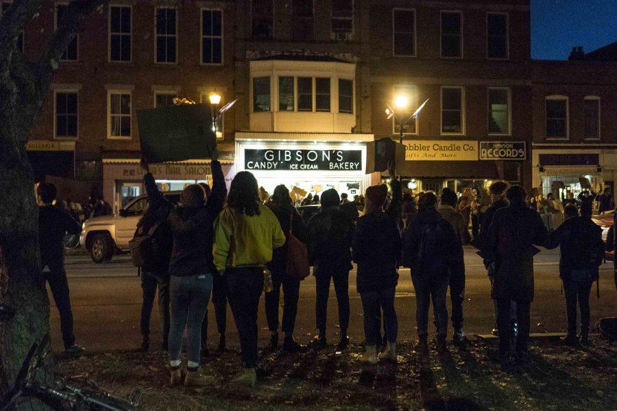 Students chant across the street from Gibson’s Bakery in Tappan Square Thursday evening. Protests ran from around 11 a.m. until Gibsons closed at 11 p.m.