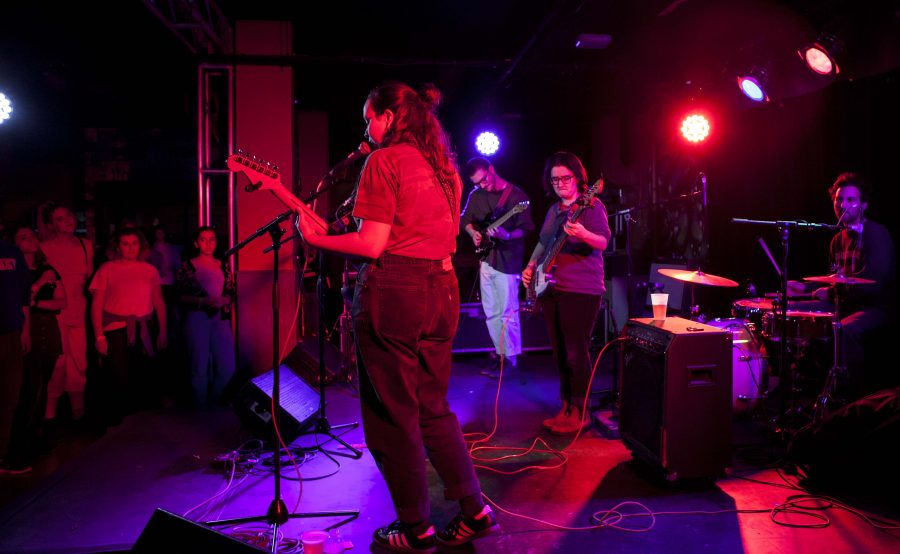 Kenyon alumni perform together as the basement rock band SPORTS. The group concluded its tour at the ’Sco
Monday night with songs from its sophomore record All of Something.