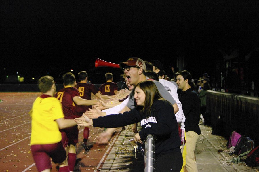 Fans congratulate the Yeomen after their 2–1 NCAC semifinal victory over Wabash College. The victory propelled the team to its first conference championship match in school history.