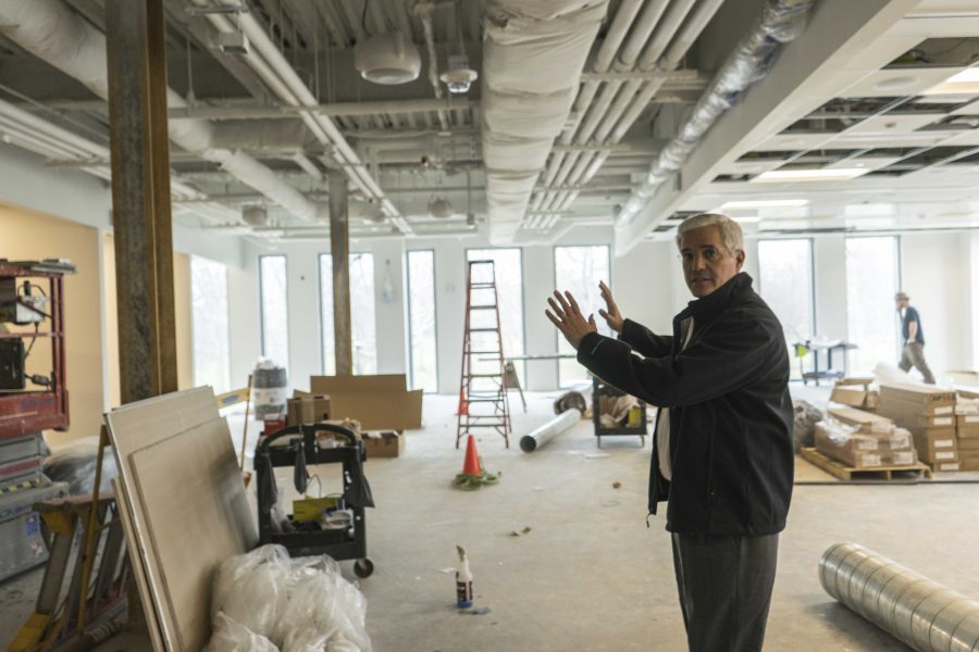 Dean of the College of Arts and Sciences Tim Elgren tours the unfinished space of StudiOC, which will house the course cluster program. With the March 10 deadline for faculty to submit course cluster proposals approaching, it is still unclear what multidisciplinary courses will be offered.