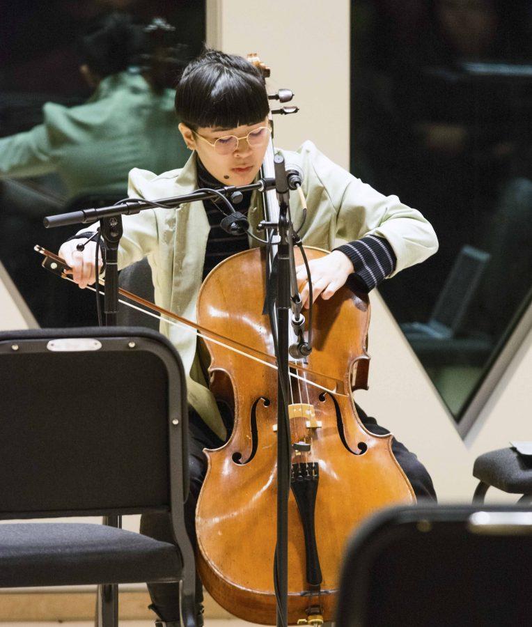 College first-year Alex Chuang performs Green Island Serenade on cello, voice and
jitter box during the TIMARA Winter Term final concert Tuesday