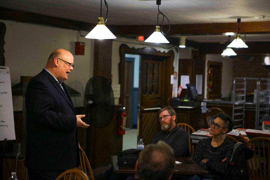 City Manager Rob Hillard holds a listening session with community members and students at the Rathskeller Monday evening as the search for the new police chief continues. The attendees emphasized that the new chief should prioritize residents well-being.