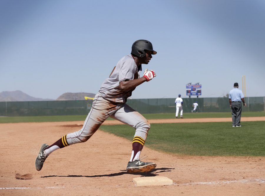 First-year outfielder Amari Newman rounds the base during a game against the Luther College Norse on March 19 on the team’s spring break trip in Tucson, AZ. The team will head to Granville, Ohio, tomorrow to play the Denison University Big Red.
