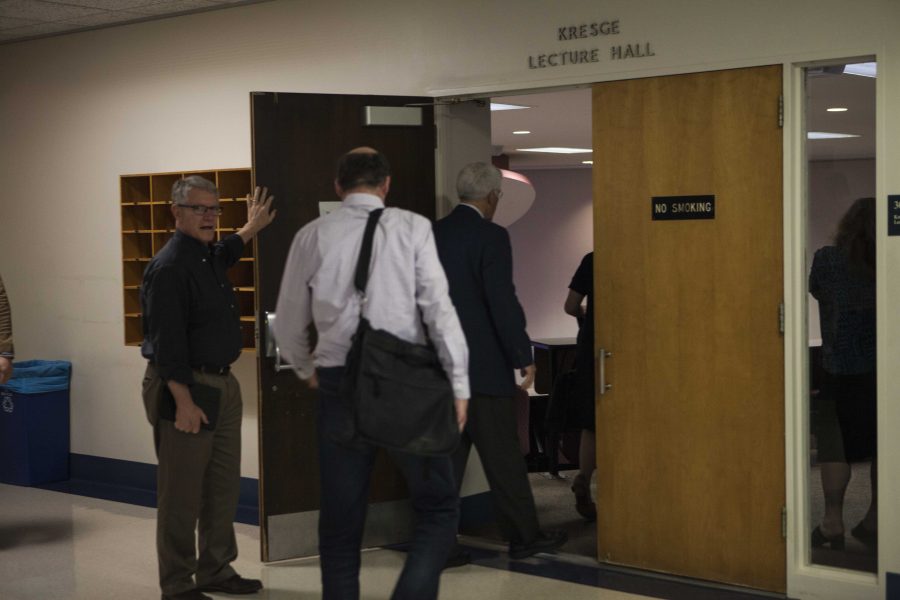 Faculty and administrators enter King Building Room 306 for Wednesday's General Faculty meeting. With impending administrative turnover, faculty is reckoning with the viability of the Strategic Plan.