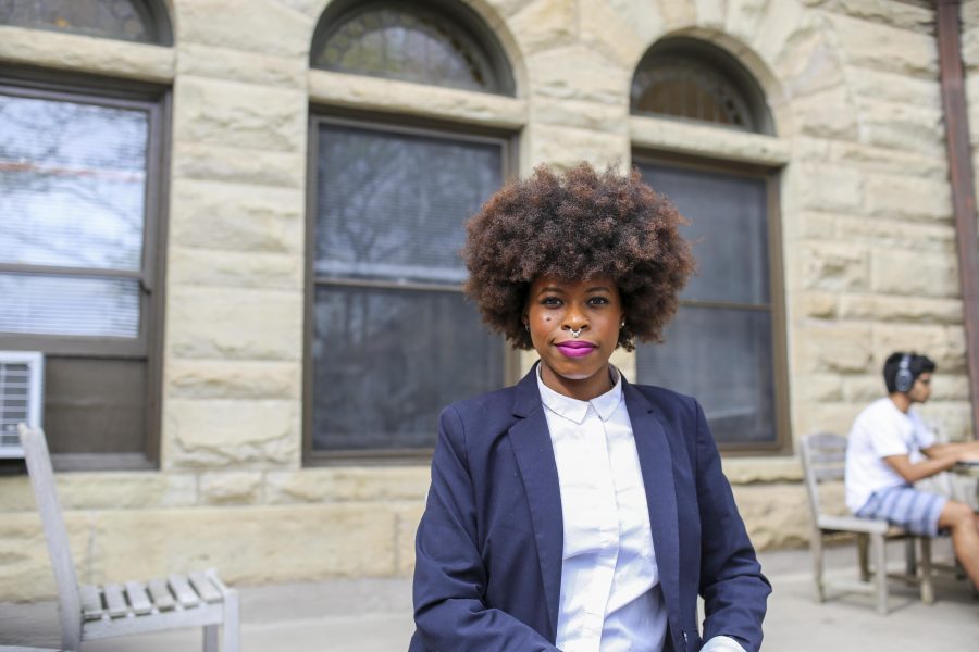 Toni Myers, the new permanent director of the MRC, sits outside Wilder Hall. Myers hopes to expand community
outreach and may sponsor a Social Justice Leadership ExCo next semester.