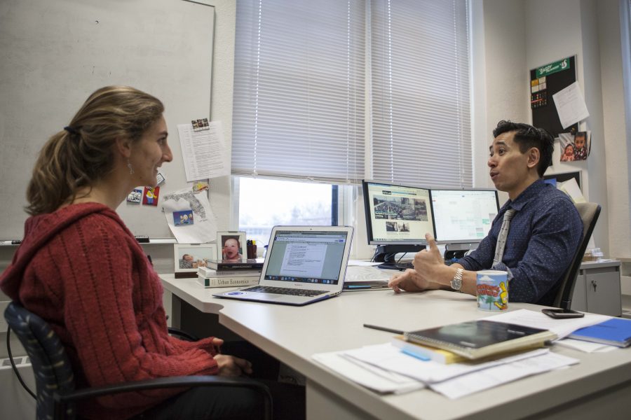 College junior Naomi Roswell and Associate Professor of Economics Ron Cheung meet in Cheung’s office in Rice Hall. They are partners in the Student-Faculty Partnership Program, which engages faculty and students in a collaborative effort to improve teaching quality.