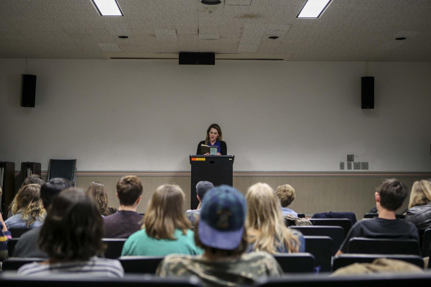 Poet, editor, and assistant professor of English at Cleveland State University Caryl Pagel reads to an audience in Wilder Hall. Pagel came to Oberlin Wednesday to give a poetry reading in which she debuted several new works.