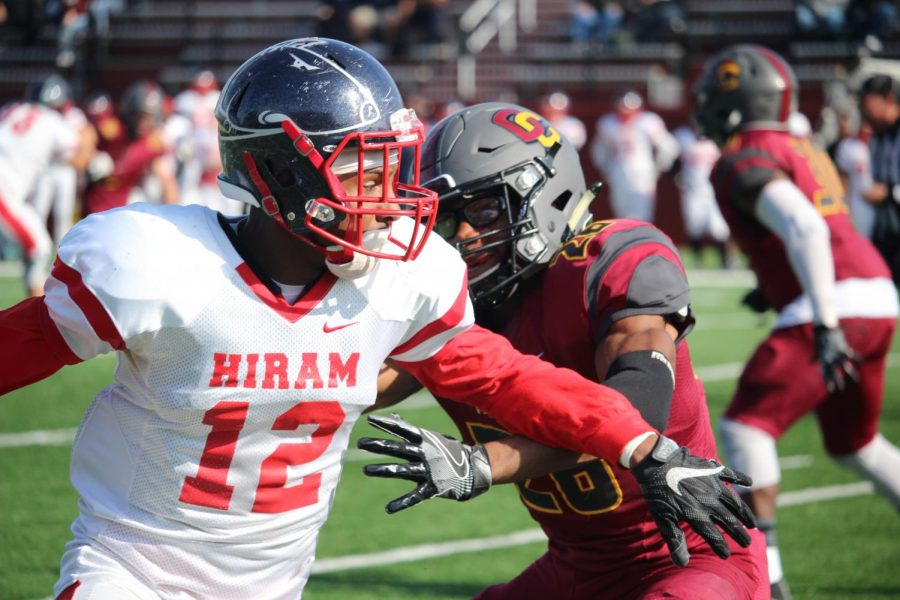 Sophomore defensive back Jubreel Hason plays tight coverage against the Hiram College Terriers receiver last Saturday in their 27–14 win