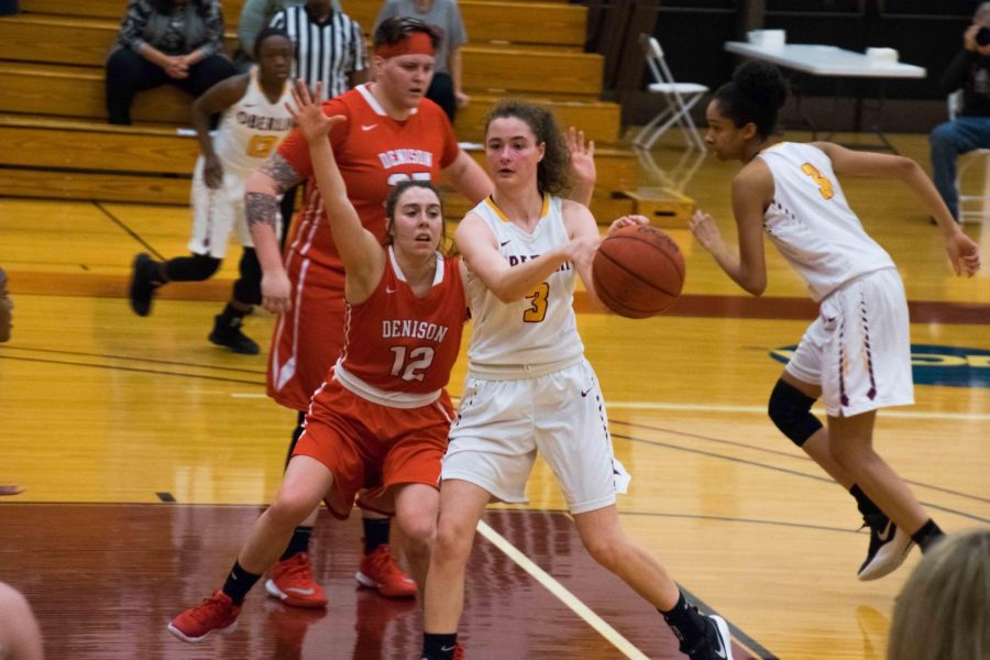 Sophomore Ally Driscoll looks to make a pass in a 66–52 victory Tuesday against #6 Denison University. The Yeowomen will face #2 Kenyon College in a semifinal matchup today at 7 p.m. in Greencastle, IN.