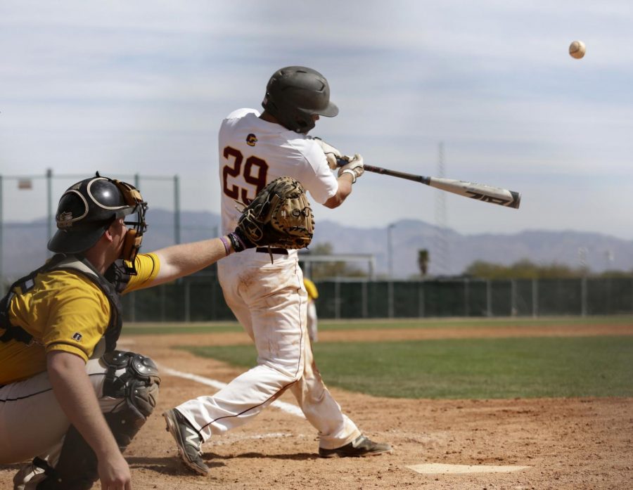 Junior+catcher+Brendan+Mapes+rips+the+ball+against+competition+in+Tucson%2C+AZ.+Mapes+currently+leads+the+team+in+conference+play+with+a+.350+batting+average.