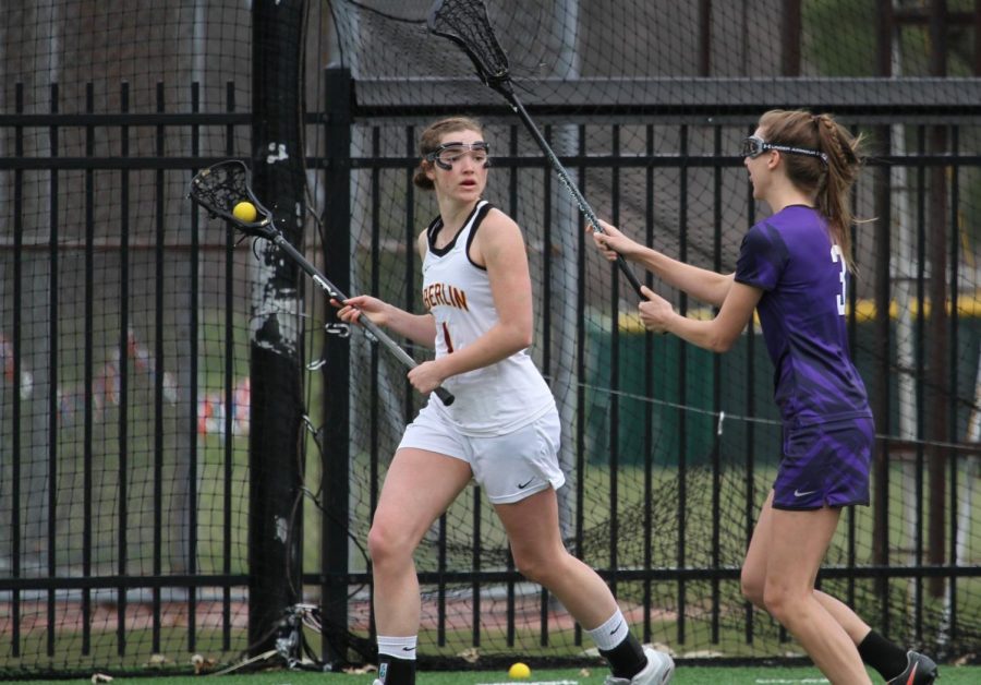 Senior midfielder Sydney Garvis attempts to rifle the ball past a Kenyon College Ladies defender on senior day. The Yeowomen ended their season last Wednesday against the College of Wooster Fighting Scots in the NCAC semifinals.