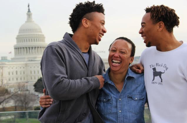 Malachi and Jabari Clemons with their mother.