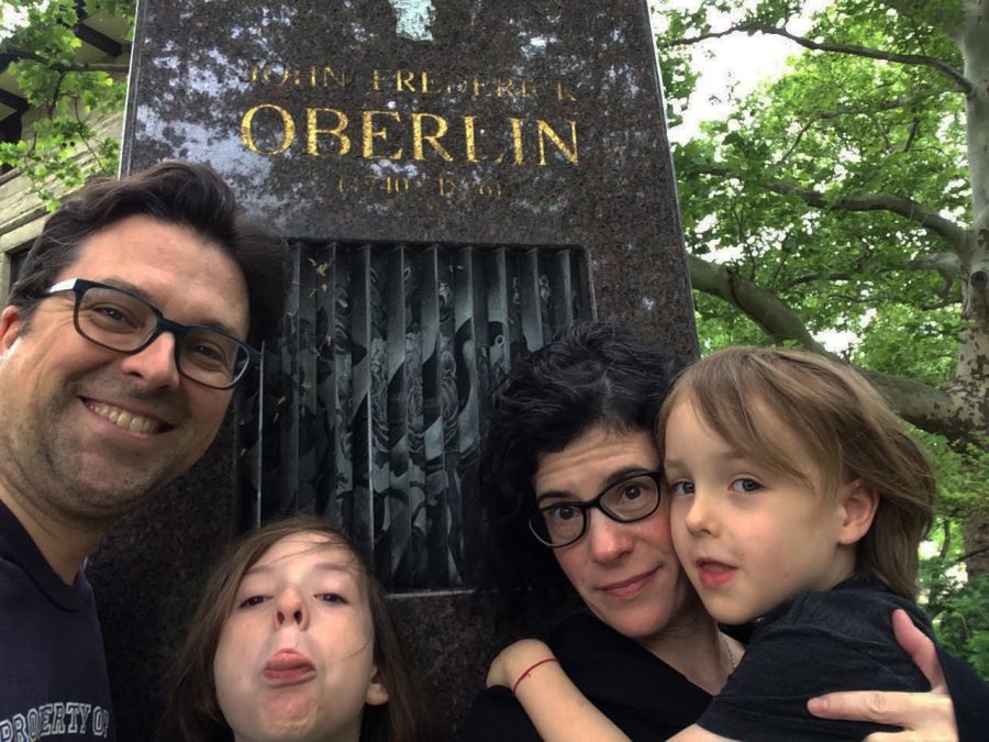 Professors+Emily+Barton+and+Tom+Hopkins%2C+new+staff+in+the+Creative+Writing+department%2C+are+quite+proficient+in+the+art+of+the+selfie+and+taking+family+portraits+around+Oberlin.