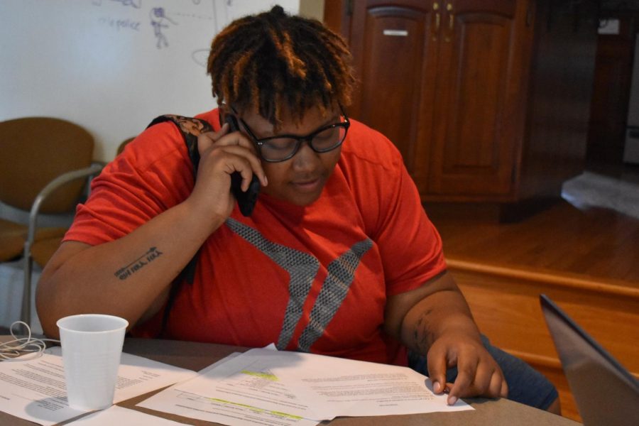 College senior Le’Priya White participates in Call Your Rep Day, an UndocuWeek event meant to encourage local representatives to adopt policies supportive of undocumented immigrants.