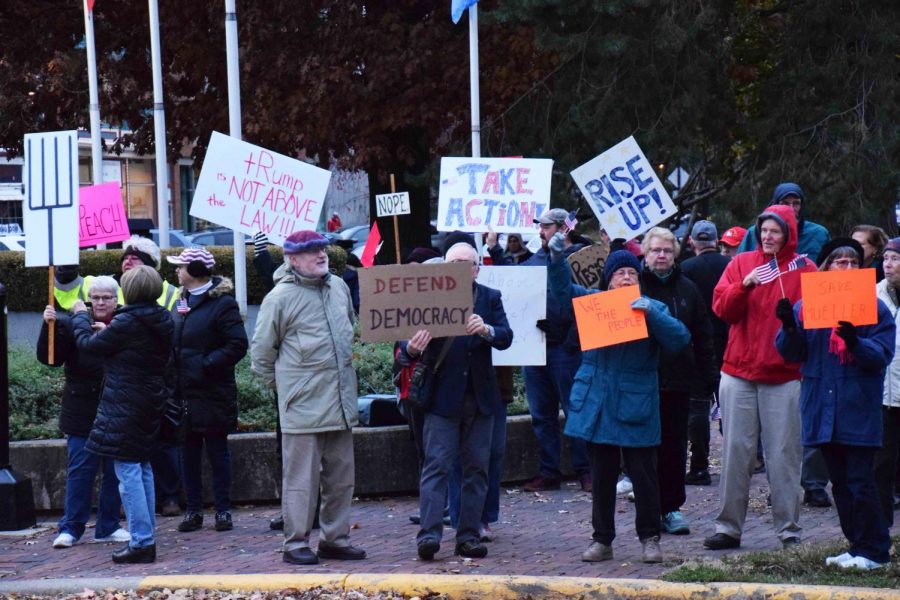 Protestors participate in a “Nobody is Above the Law” rally in Tappan Square.