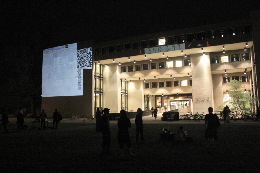 A visual history of Oberlin activism was projected onto the outside of Mudd Center last Thursday.