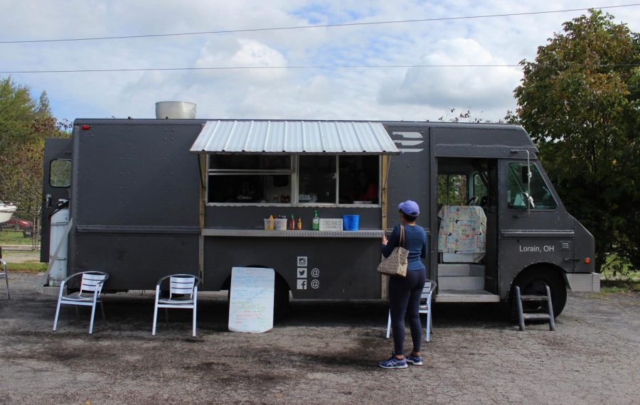 Steel Magnolia, a food truck and catering service serving Caribbean and Southern-style cuisine, is located at 408 E. Lorain Street.