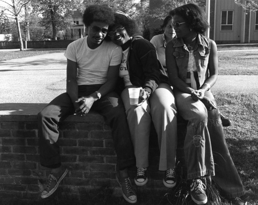 Residents of Afrikan Heritage House relax in South Bowl during the 1970s.