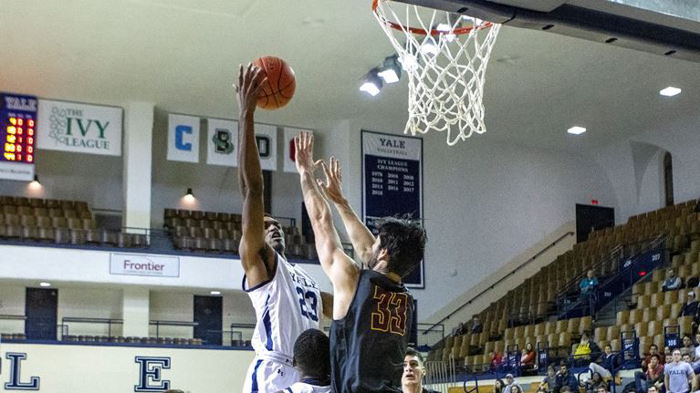 College third-year Jordan Armstrong defends the basket.
