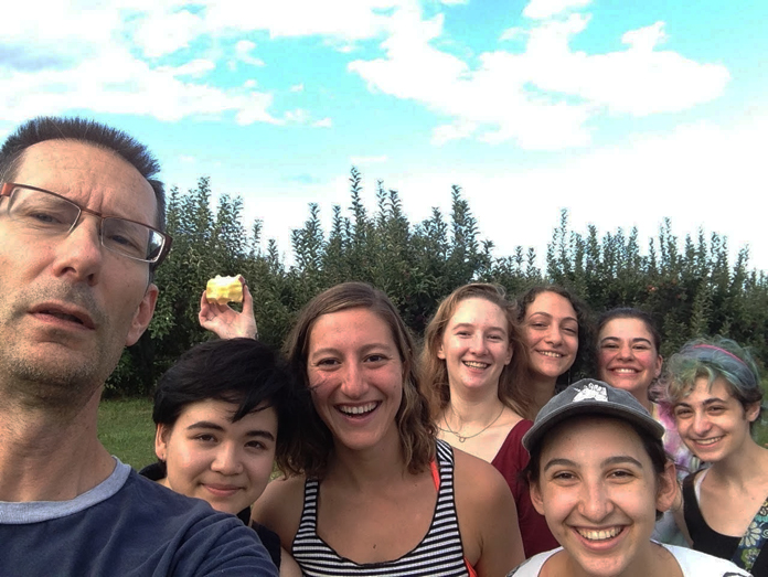Nathan A. Greenberg Professor of Classics and Acting Chair of Comparative Literature Kirk Ormand and former students in his “Odysseys and Identities” first-year seminar class on an apple-picking trip.