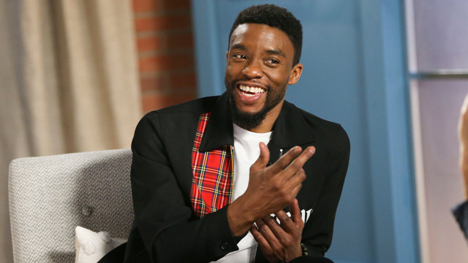Chadwick Boseman smiles during an interview. 