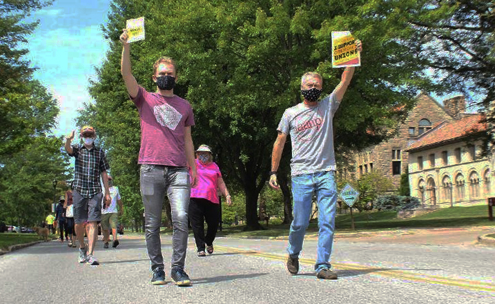College UAW workers gathered on Aug. 15 for a socially distanced parade to say goodbye to outsourced colleagues. 
