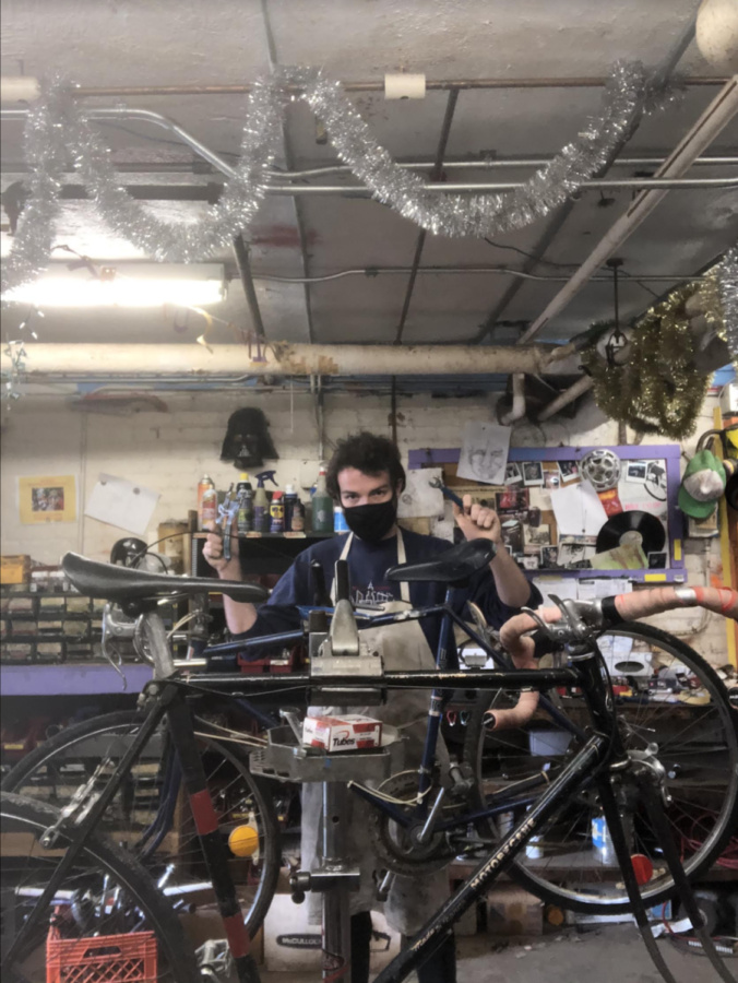 College fourth-year Tom LoVoi puts in a mechanic shift at the Oberlin Bike Co-op, which is looking for new first- and second-year members.