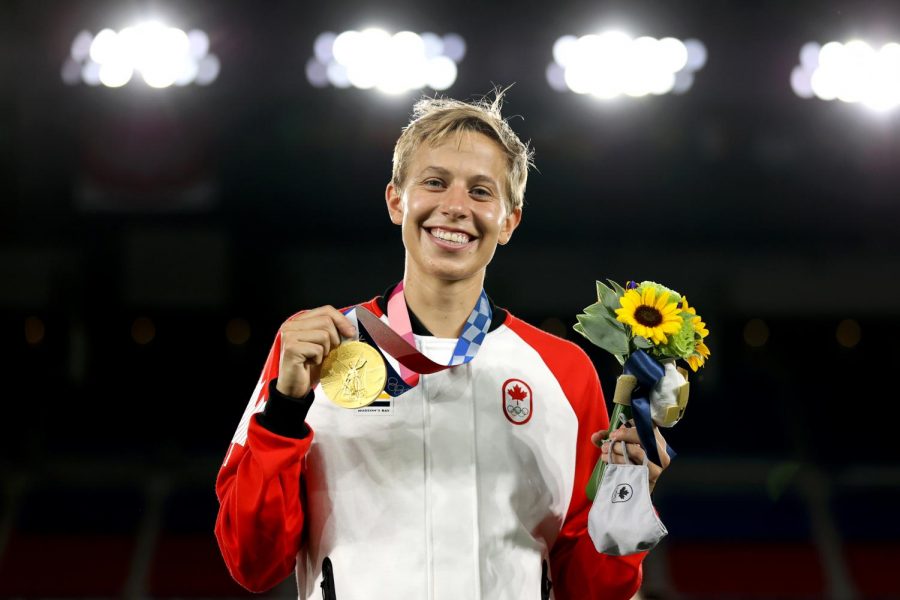 Canadian soccer player Quinn winning a gold medal at Tokyo 2020 Olympic Games.