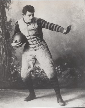 John Heisman poses in his iconic stance back in the day. 