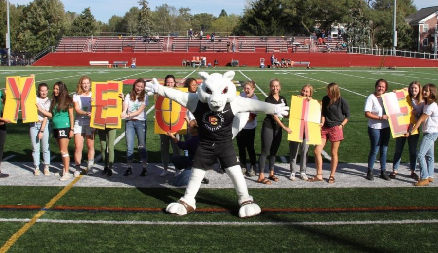 Yeobie stands before the crowd on Bailey Field celebrating with students at Homecoming in 2019. 
