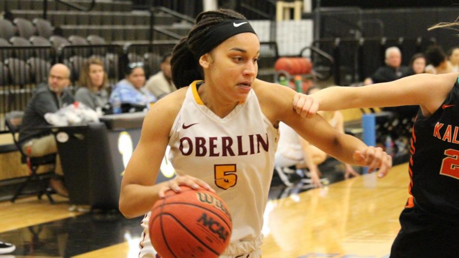 Fourth-year on the women’s basketball team, Rowan Smith, dribbles up the court.