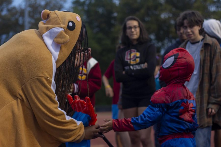 A young Spiderman participates in a Track or Treat event.