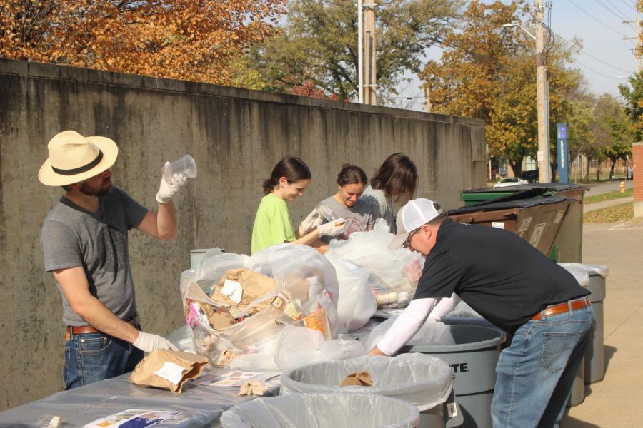Students+and+volunteers+sort+through+trash+during+a+waste+audit+organized+by+the+College+throughout+the+week+to+determine+future+sustainability+and+recycling+practices.