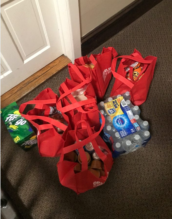 A student’s welcome package is delivered to their door as part of AVI Foodsystems’ food delivery program for students in isolation. 
