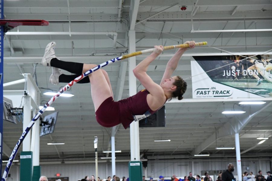 
Sarah Voit sails through the air during pole vault to earn indoor All-American honors. 
