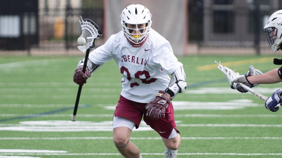 College+fourth-year+and+men%E2%80%99s+lacrosse+player+Michael+Muldoon+cradles+the+ball+on+Bailey+Field.