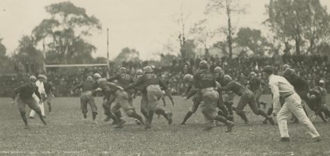 Oberlin football team in 1921 playing football. 