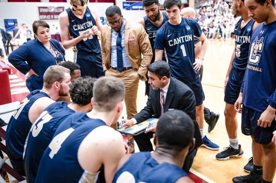Shiva Senthil draws up a play for his previous basketball team at SUNY Canton. 