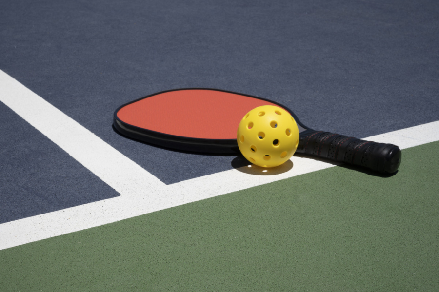 Pickleball is played using a paddle and ball.