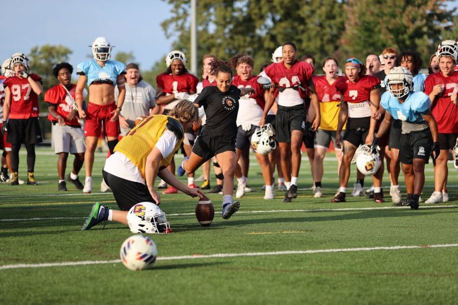 Women’s soccer fourth-year Camille Franklin kicks a field goal.